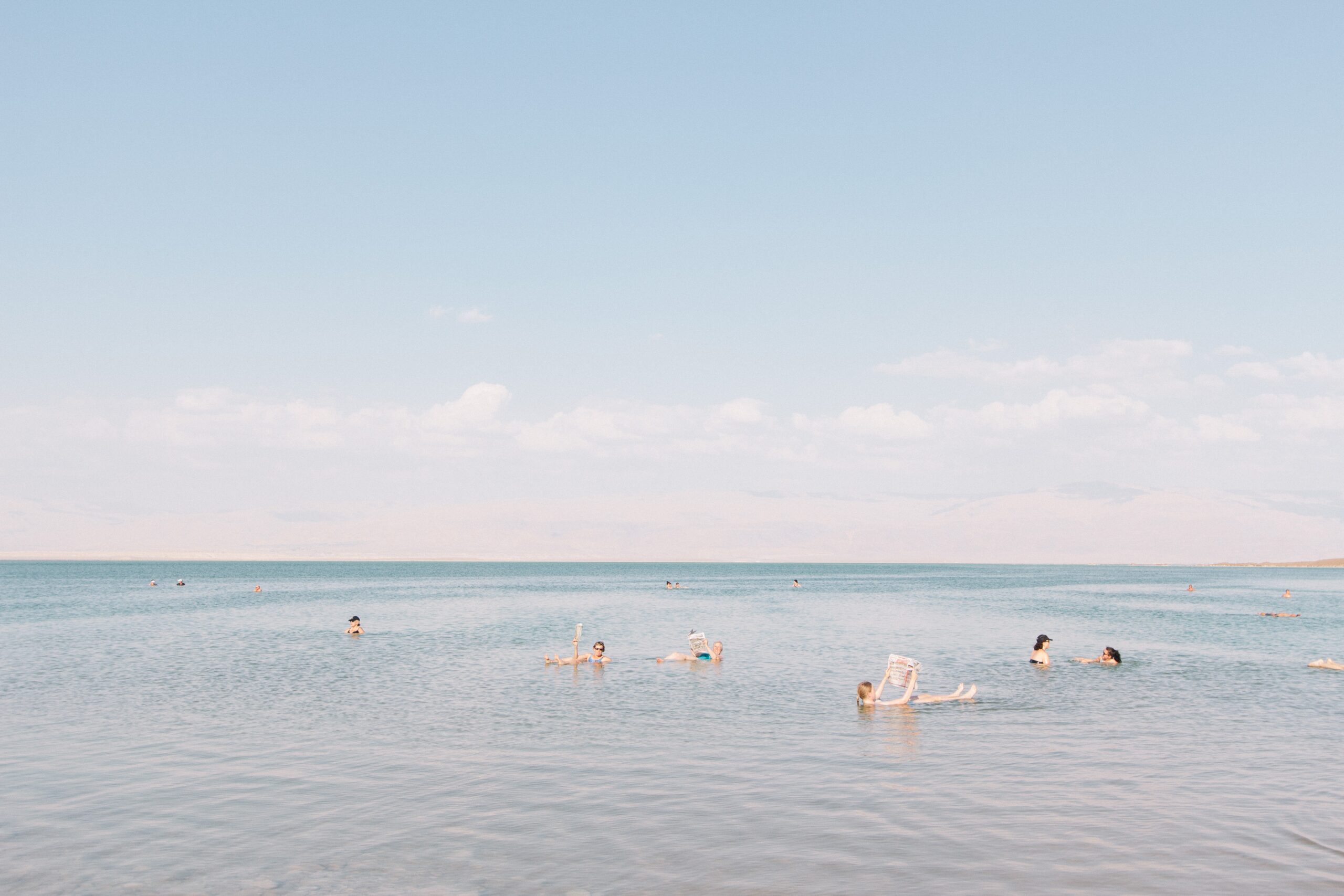 floating effortlessly on surface of Dead Sea