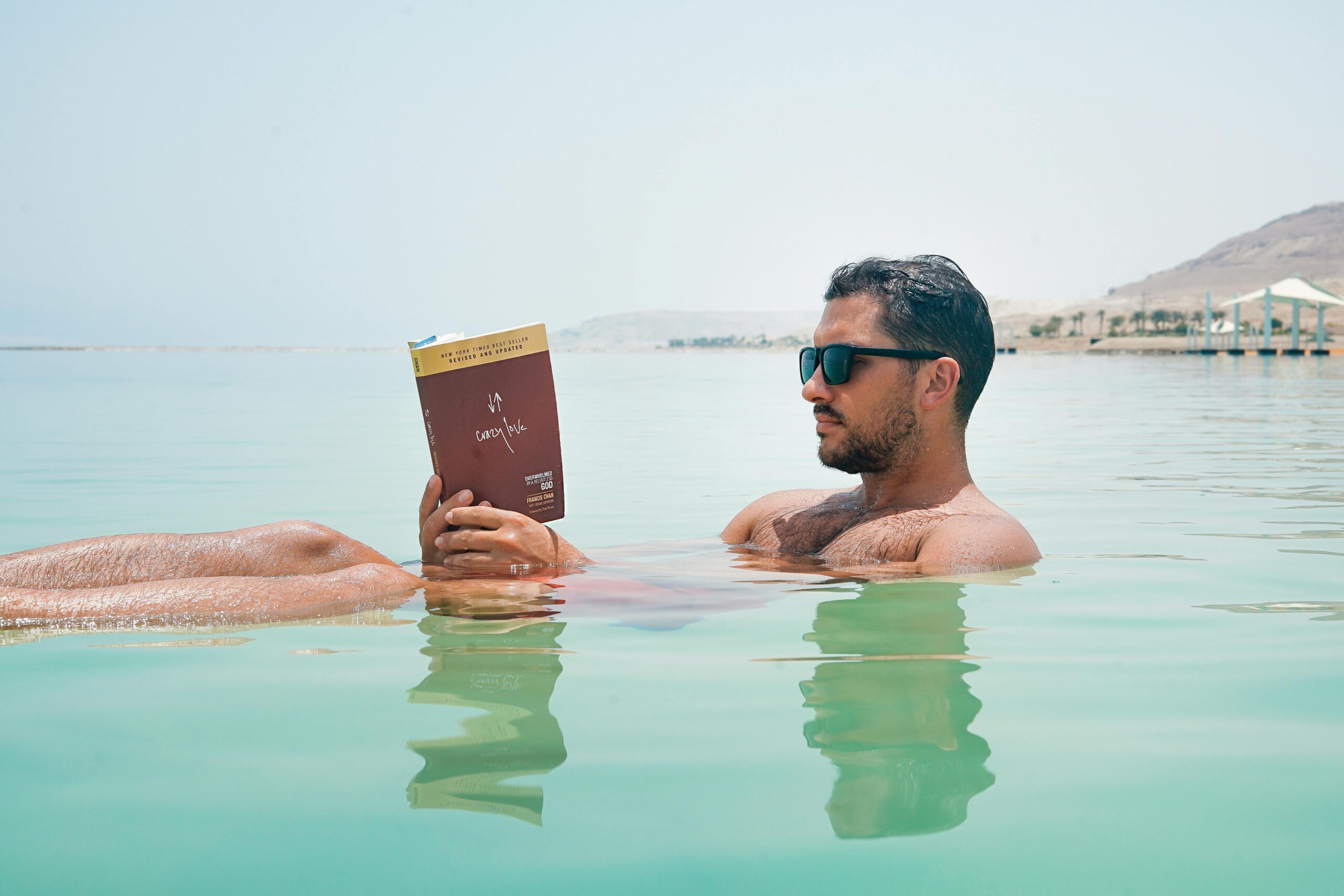 Tourist Floating in The Dead Sea.